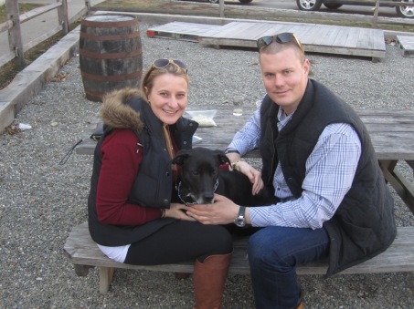 bench photo. Man and woman with a dog.