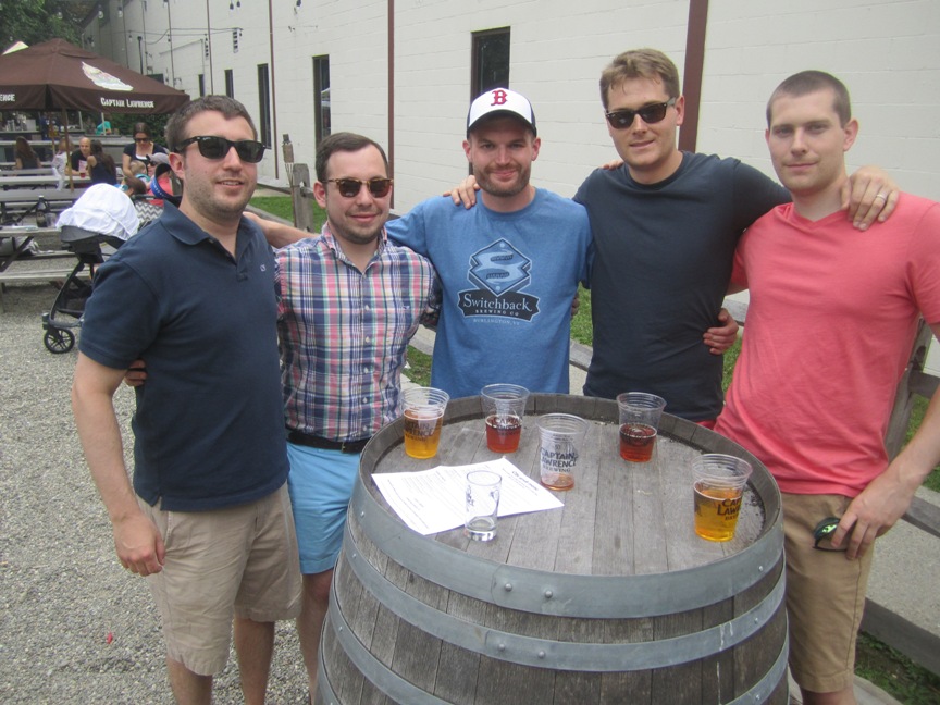 UVM boys gathered around barrel