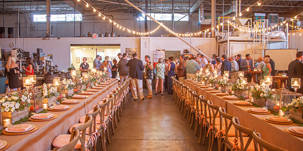 wide shot of a wedding rehearsal in the brewery space