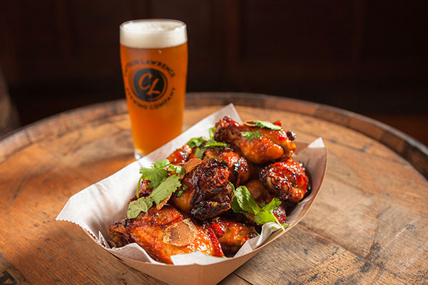 wings and captain lawrence beer on a barrel