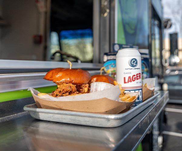 Food Truck Chicken Sandwich with can of Lager