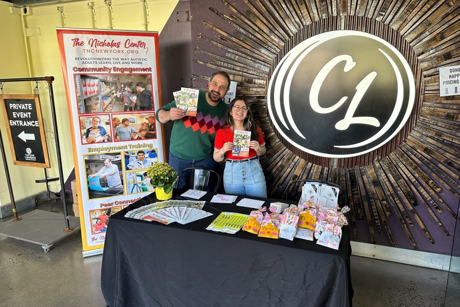 The Nicolas Center table for a Community Pints event in April 2024